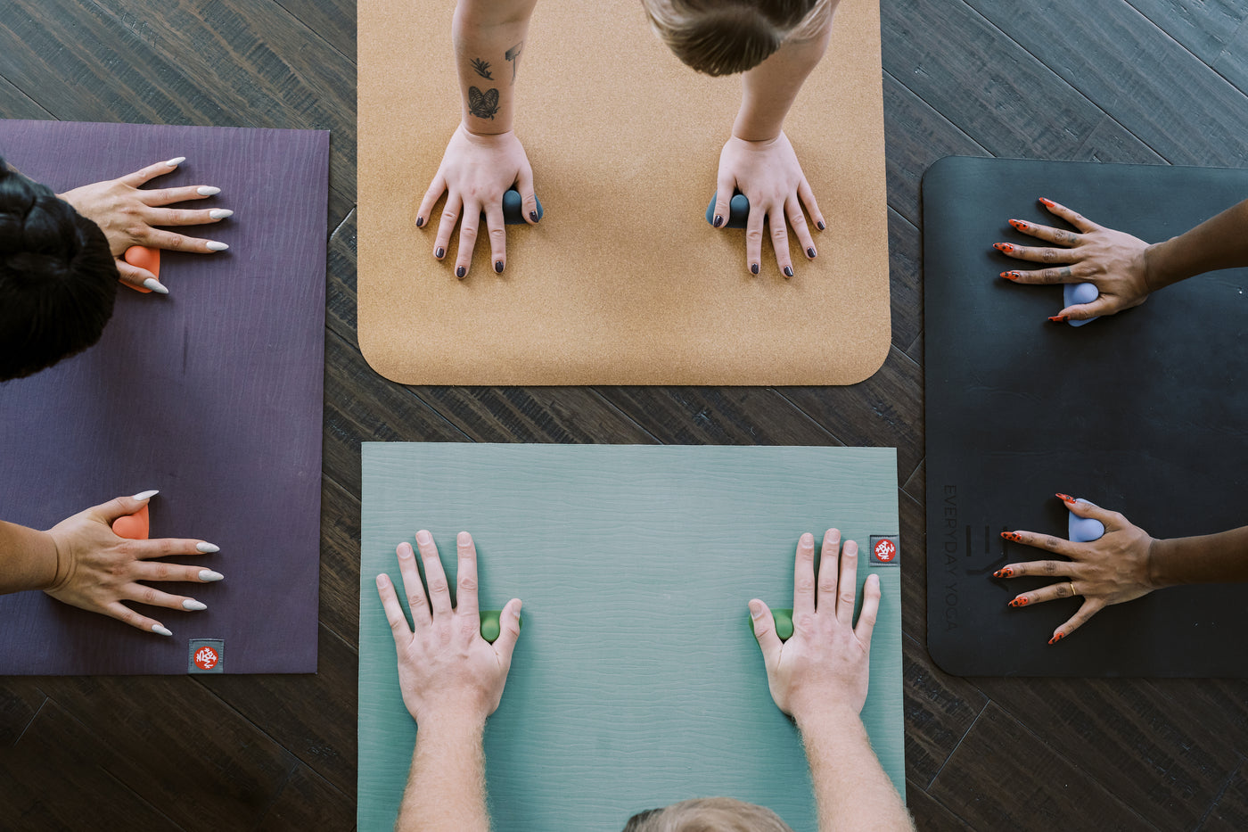 yoga rocks used as hand grips to support alignment 